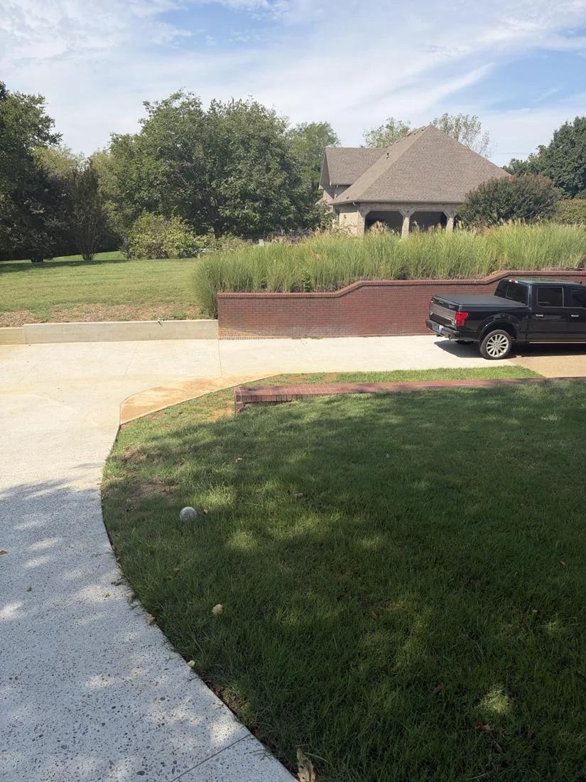 Original residential exterior and landscape site photograph